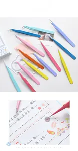 Detail of macaron color stainless steel tweezers for scrapbooking and DIY crafts