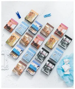 Flat lay of vintage style mini decorative paper cards in six different thematic series