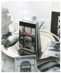 Vintage photography notepad with monochrome streetcar design on a metallic tray