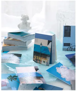Artistic blue landscape photography mini journal cards on soft blue background