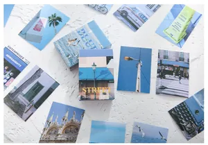 Artistic photography paper set featuring blue street scenes and ocean landscapes