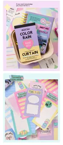 Close-up of cute Korean style sticky notes and colorful memo pads set in a storage box