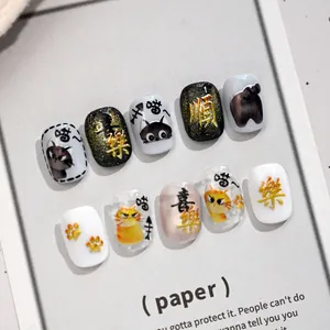 Short square-round press-on nails set with lucky cat illustrations and golden 3D cat paws