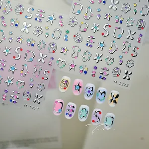Detailed 3D silver embossed star and flower nail stickers with glitter accents