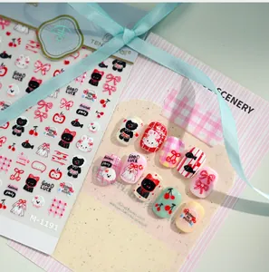 Detailed view of M-1191 cartoon cat and bow nail art stickers with applied examples