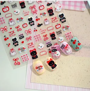 Detail of cute rabbit and cat 3D embossed nail stickers on pastel color tips