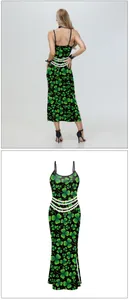 Detail of St. Patrick's Day dress with green clover print and triple pearl waist trim