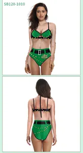 Detail view of long sleeve swimsuit featuring festive 3D Christmas print and faux bikini design