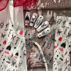 Gothic nail stickers featuring dark butterflies, skulls, and castles with shell luster