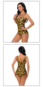 Detail of leopard print one-piece swimsuit with shimmering gold glitter and open back