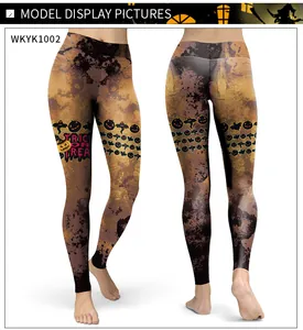 Detailed view of Halloween leggings featuring pumpkin prints and Trick or Treat text