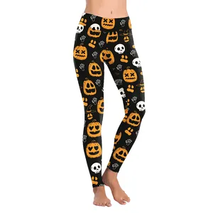 Women's Halloween leggings featuring orange pumpkin and skull digital prints on black fabric