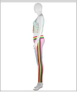 Detail view of pink yoga set with rainbow heart print and side stripe accents