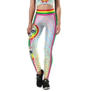 Women's pink yoga set with high waist leggings and crop top featuring rainbow skull unicorn print