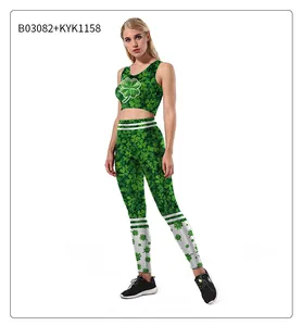 Detail of green women's workout set with all-over shamrock print and striped hem
