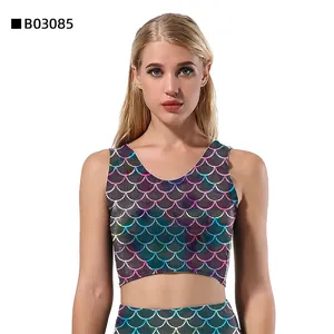 Detail of 3D digital mermaid scale print on sleeveless crop top and leggings sportswear set