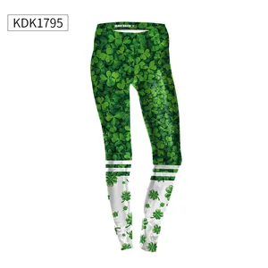 Detail view of St. Patrick's Day leggings featuring green shamrock prints and stripes