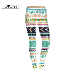Detail showing colorful heart and clover patterns on white printed women's leggings