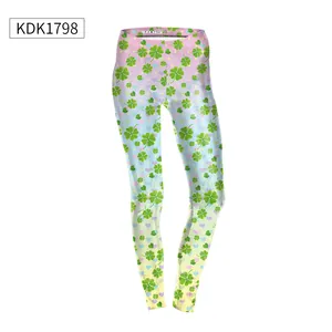 Close-up of high-waist leggings featuring clover, heart and star patterns in 3D digital print