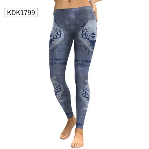 Detail of high-waisted leggings with blue deer and geometric tribal print pattern