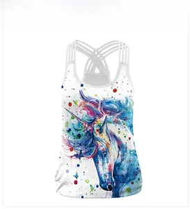 Detail of cross-back straps and colorful unicorn print on white sleeveless crop top