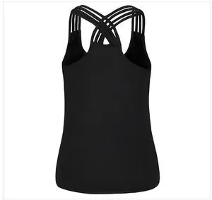Detail view of the black tank top featuring a criss-cross back strap design and cutout