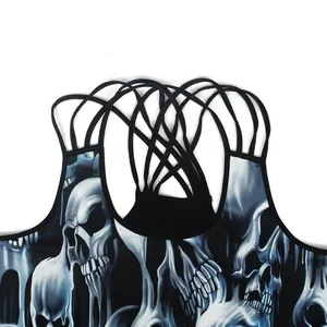 Black crop top with skull digital print featuring criss-cross back straps and backless design