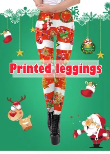 Close-up of Christmas leggings with red stripes, gingerbread men and festive patterns