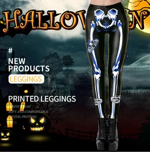 Detail of Halloween skull print leggings featuring blue bone patterns and moth graphics