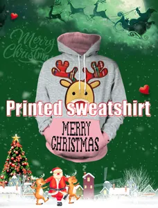 Detail of Christmas hoodie featuring cartoon reindeer print and Merry Christmas text