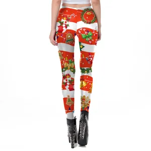 Women's Christmas leggings featuring candy canes and gingerbread man prints on red white stripes
