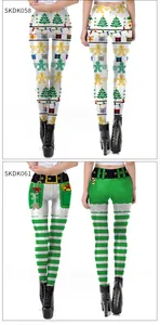 Detail view of festive Christmas leggings with gingerbread man and elf stripe prints
