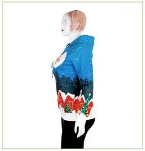 Detail view of Christmas hoodie featuring festive prints and white ribbed cuffs