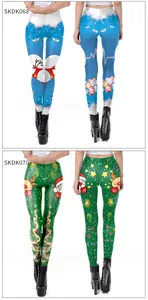 Detail of Christmas digital print leggings showing deer, Santa, and tree holiday patterns