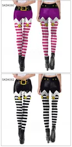 Detailed view of Christmas elf-style printed leggings in purple and black festive designs