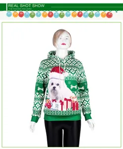 Détail du sweat à capuche de Noël avec imprimé chien 3D et flocons sur tissu vert