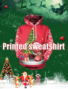 Détail de l'imprimé 3D de Noël sur hoodie rouge avec Père Noël et sapin décoré