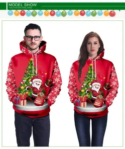 Détail d'un sweat à capuche de Noël avec imprimés 3D du Père Noël et de sapins