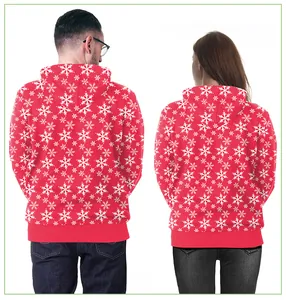 Détail du sweat à capuche de Noël rouge avec imprimé flocons 3D et poignets à bords-côtes