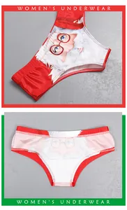 Macro view of women's red festive panties with Santa Claus print and elastic fabric
