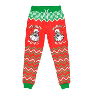 Kids Christmas joggers with Santa print and Merry Xmas text in festive red and green