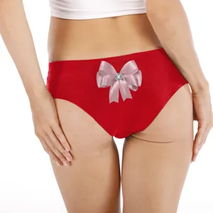 Sexy red Christmas panties with a pink satin bow and crystal detail for women