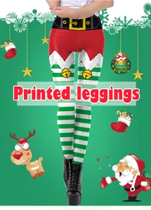 Detail of Christmas leggings featuring Santa belt print and green white striped patterns