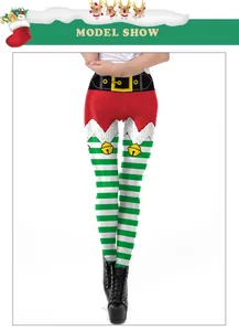 Detail of Christmas leggings featuring 3D green stripes and festive belt print on model