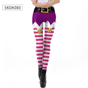 Detail of Christmas elf leggings featuring festive 3D stripe print and belt buckle graphics