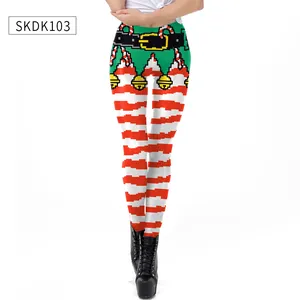 Detailed view of Christmas leggings with pixel art belt pattern and red white stripes