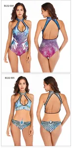 Front and back detail of mermaid scale printed swimwear with halter neck and fin accents
