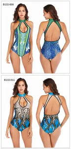 Detail view of backless one-piece swimwear featuring halter neck and octopus print