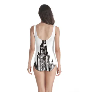 Detail of white one-piece swimsuit featuring a black architectural line art back print