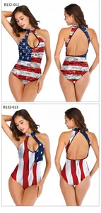 Detail view of backless halter one-piece swimsuit with American flag patterns and cutouts